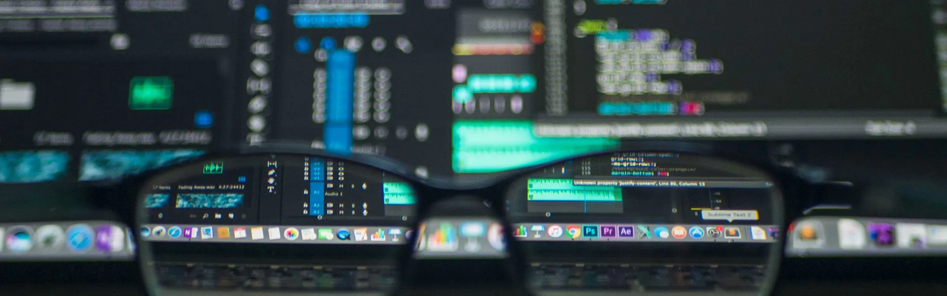 Computer screens representing legal and corporate services for software companies
