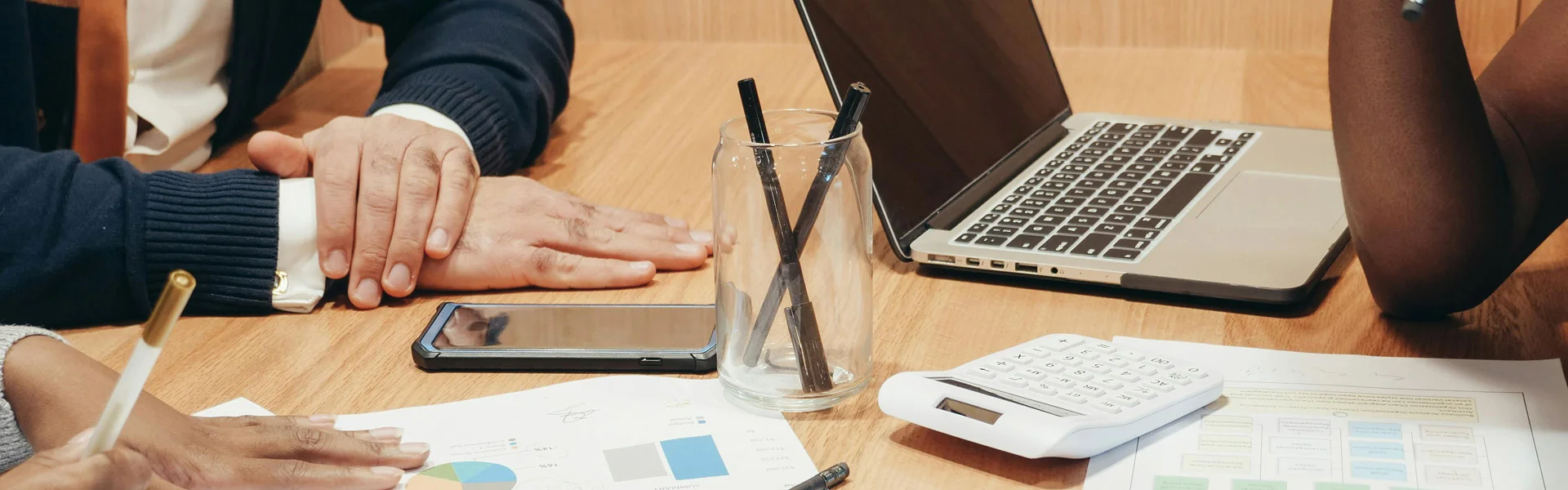 Business professionals discussing international tax planning during a meeting